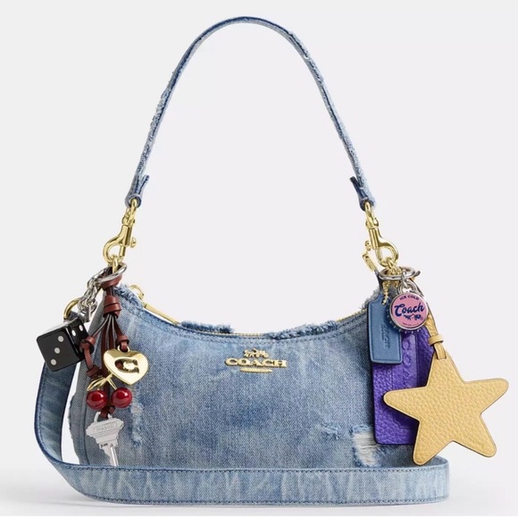 Coach Handbags - Coach Light Blue Denim Bag with Charms